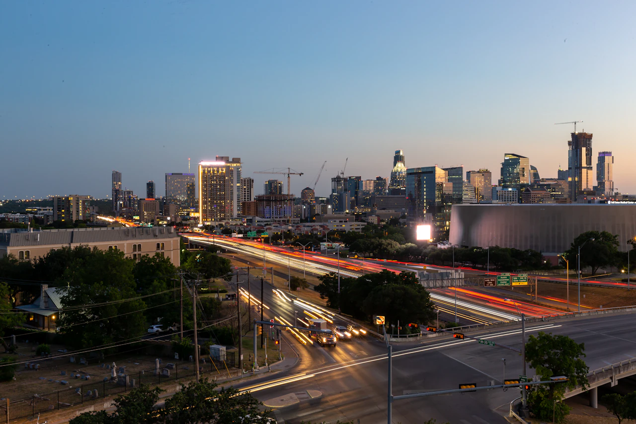 Austin skyline at dusk near I-35 and MLK.